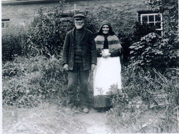 Copy of a photograph unnamed and undated with a gentleman and a lady at the Ale House, Sprinkle Pill, Llangwm Pembrokeshire